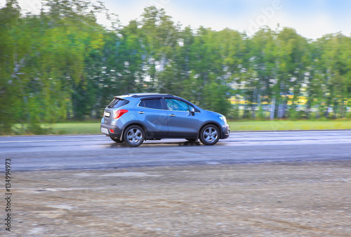 SUV moves on the highway