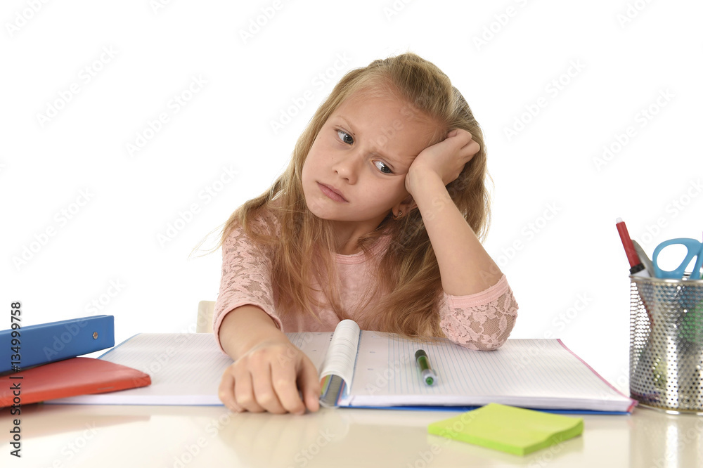 little schoolgirl sad and tired looking depressed suffering stress overwhelmed by load of homework little schoolgirl sad and tired looking depressed suffering stress overwhelmed by load of homework