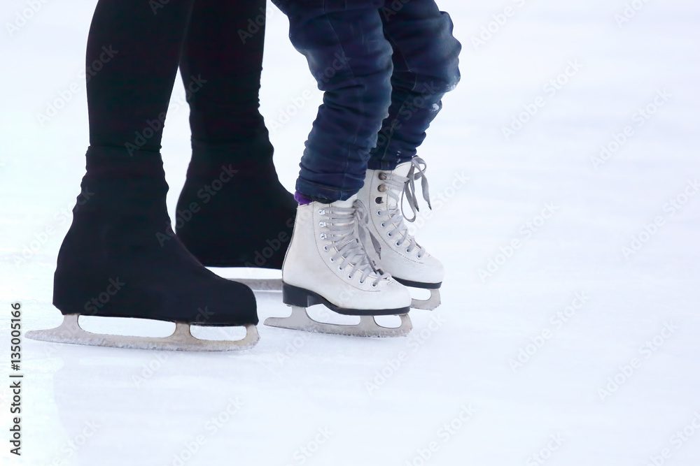 little girl and grown man skating on ice little girl and grown man skating on ice