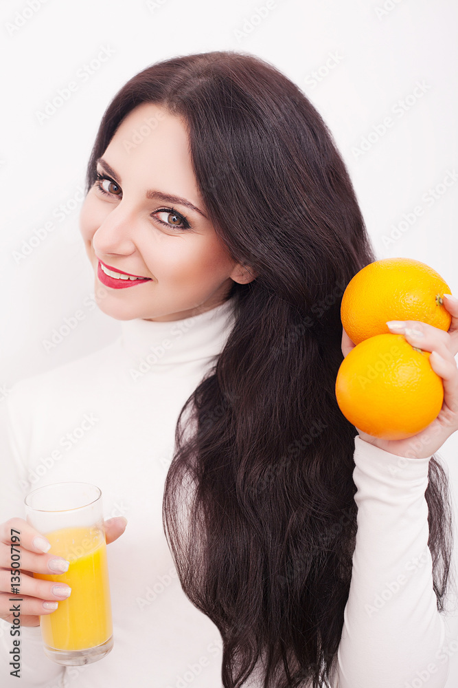 Happy smiling young woman drinking orange juice Happy smiling young woman drinking orange juice