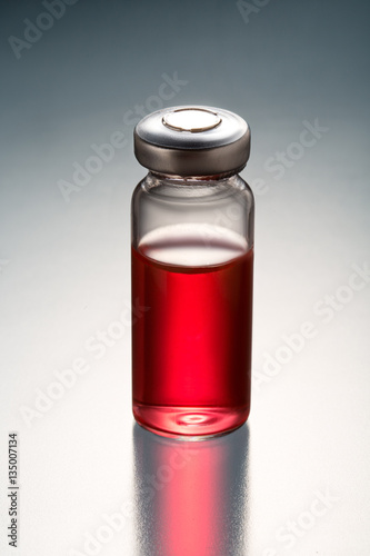 flask with red liquid