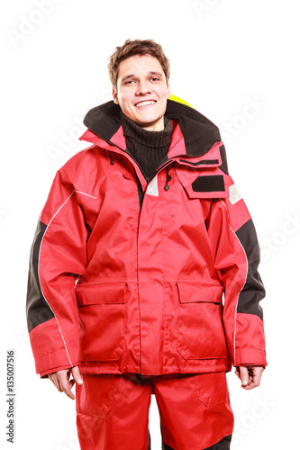 Young man in waterproof clothing.