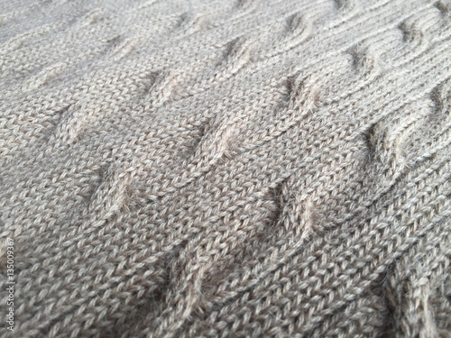 Beautiful crafted gray wool knitted background, natural soft surface