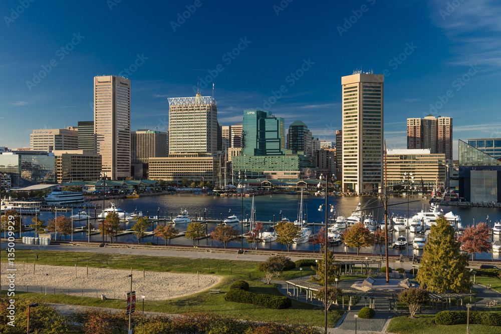 OCTOBER 28, 2016 - Baltimore Inner Harbor late afternoon lighting of ships and skyline, Baltimore, Maryland, shot from Federal Park Hill OCTOBER 28, 2016 - Baltimore Inner Harbor late afternoon lighting of ships and skyline, Baltimore, Maryland, shot from Federal Park Hill