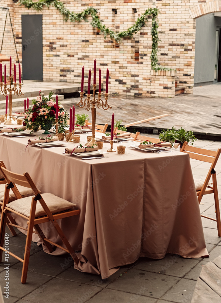 Naklejka premium Festive wedding table candle flowers