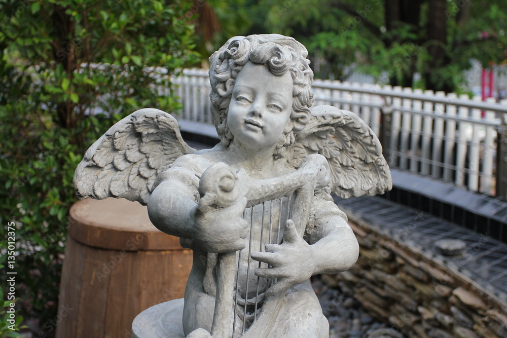Cupids statue in public park