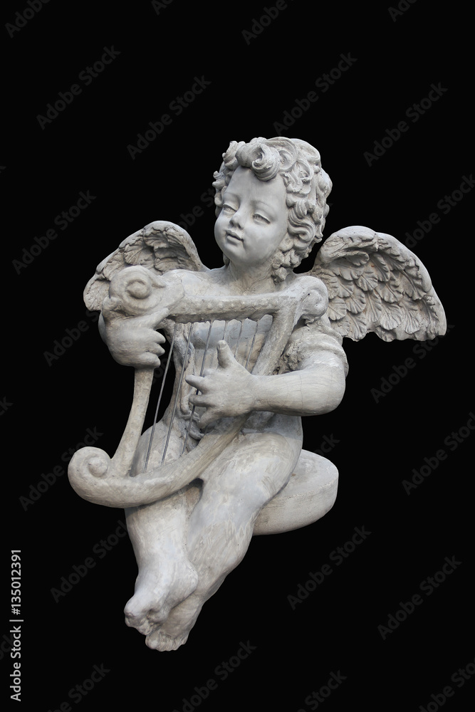 Cupids statue isolated on black background
