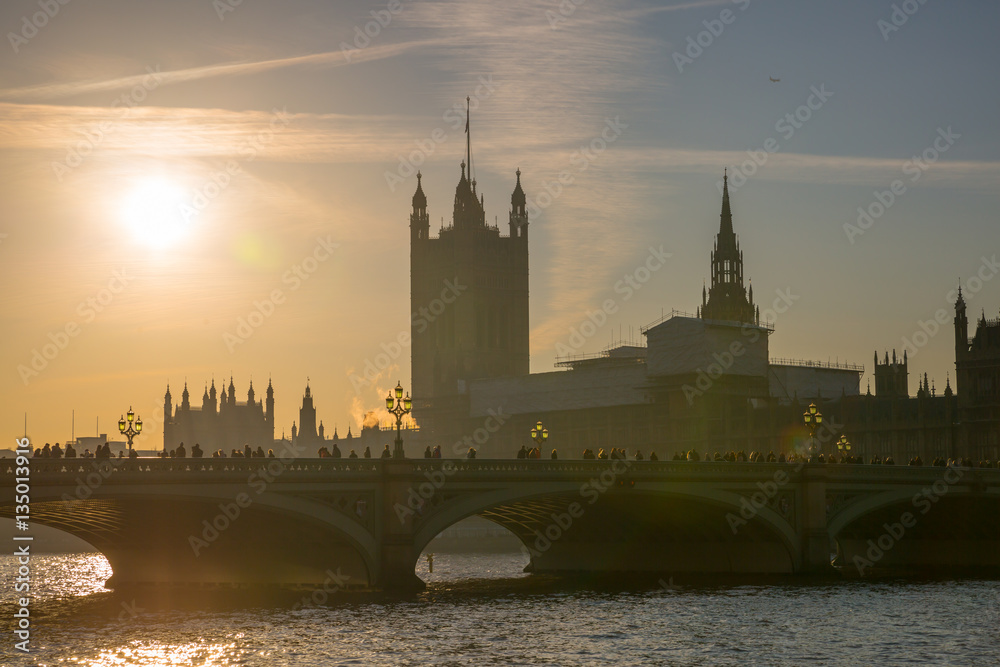 Houses of Parliament and Westminster bridge at sunset. London