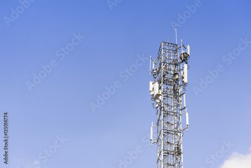 The telecommunication tower with the technician man who change spare part