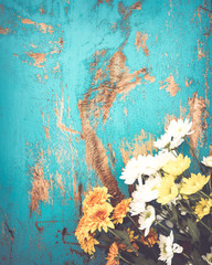 Colorful flowers bouquet on vintage wooden background, border design. vintage color tone - concept flower of spring or summer background