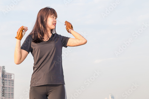 Asian woman fitness sunrise stretch before jogging workout welln photo