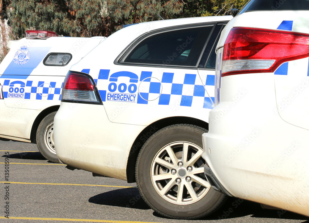 Ταπετσαρία Police vehicles parked outside a police station in Australia