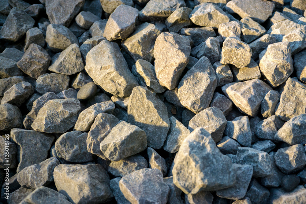 Crushed stone or angular rock is a form of construction aggregate, typically produced by mining a suitable rock deposit and breaking the removed rock down to the desired size using crushers.