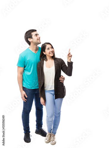 Couple looking towards copy space