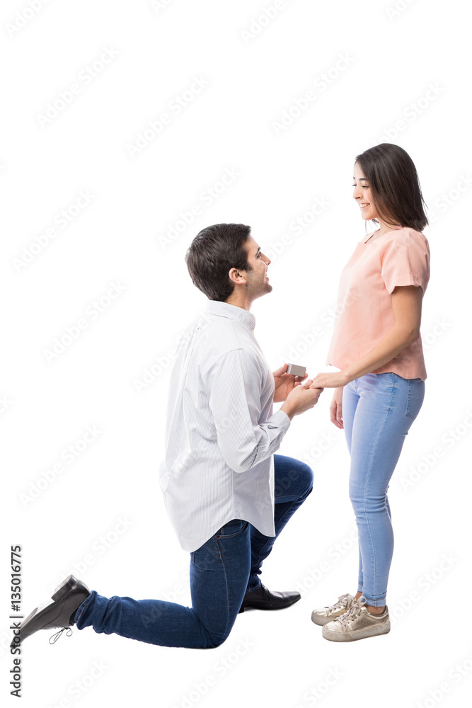 Young man proposing to his girlfriend
