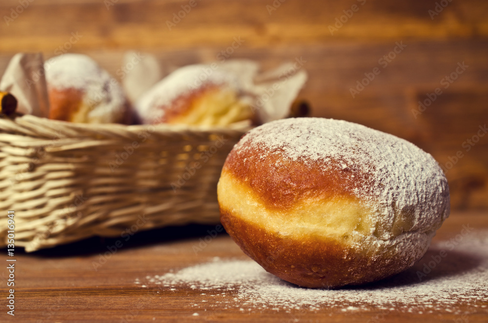 Fotografie Traditional donuts with powdered sugar