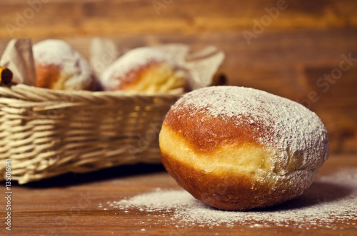 Traditional donuts with powdered sugar