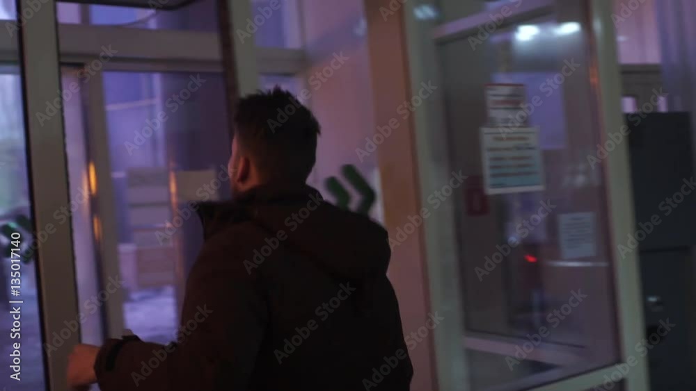 Businessman in trouble running away from danger in busy city Businessman in trouble running away from danger in busy city
