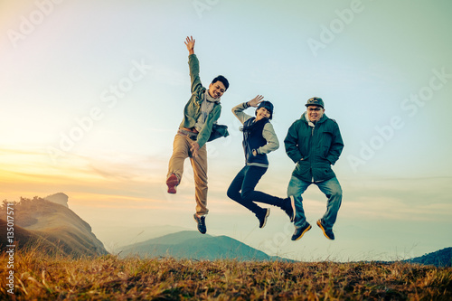 asian friends having fun jumps