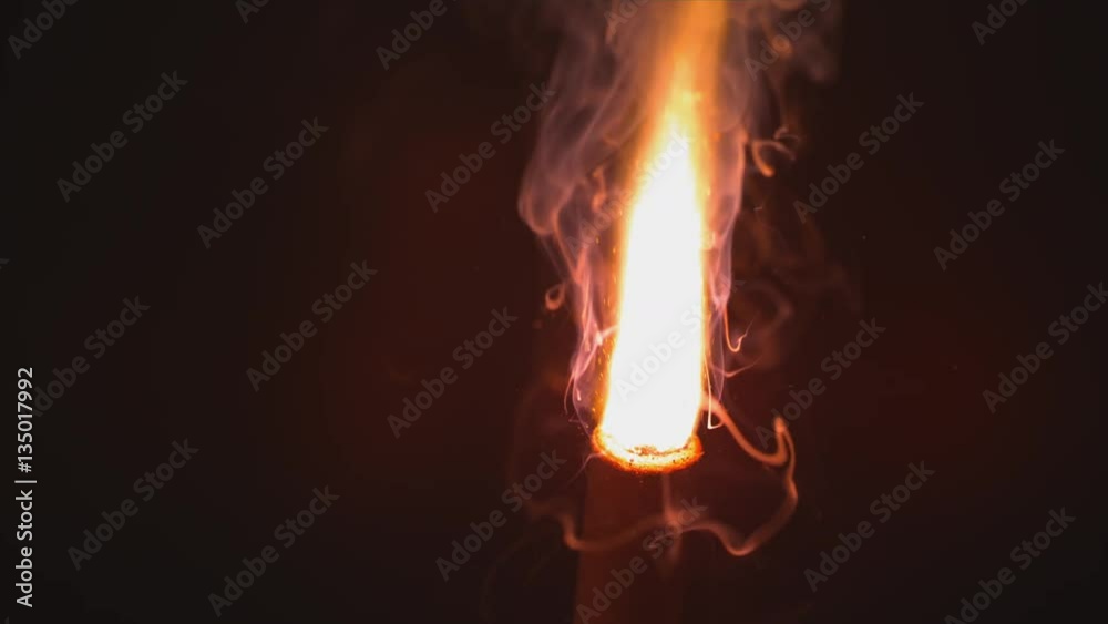 Slow Motion Flare Over Black With Wisps of Ethereal Curling Smoke Slow Motion Flare Over Black With Wisps of Ethereal Curling Smoke