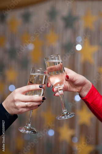 Celebration. People holding glasses of champagne making a toast