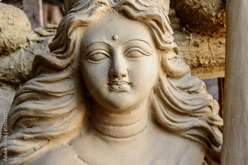 Unfinished clay idol of Hindu Goddess. Unfinished clay idol of Hindu Goddess.