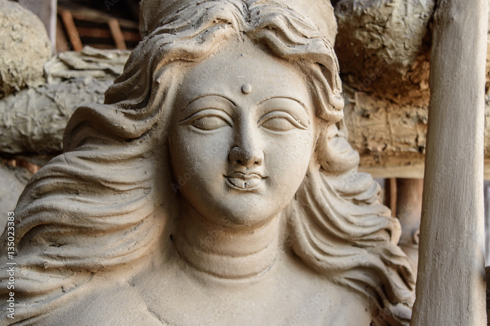 Unfinished clay idol of Hindu Goddess.