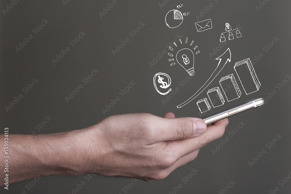 Hand holding smart phone with growing up multimedia icons Hand holding smart phone with growing up multimedia icons