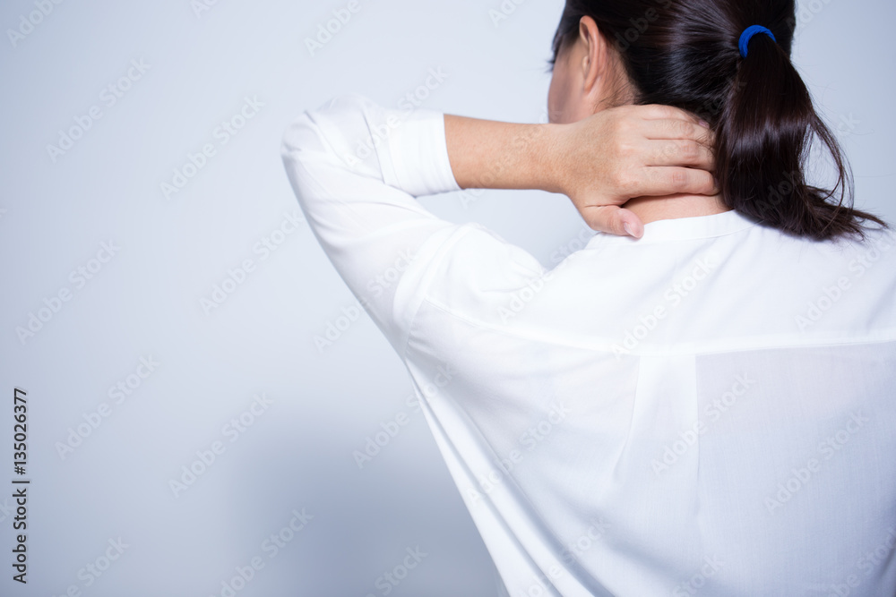 Fototapeta premium Woman has neck pain