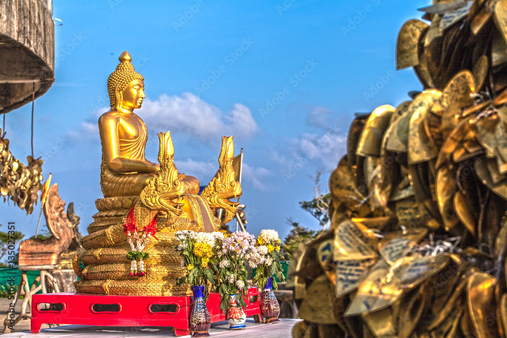 Buddha image in front of big Buddha