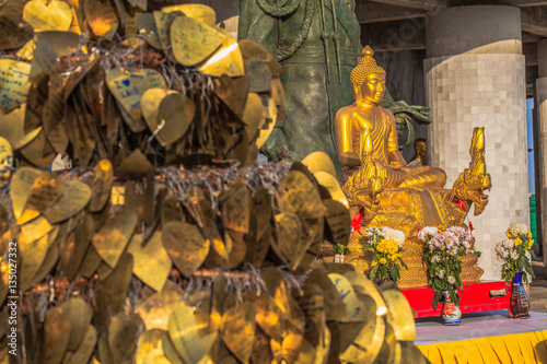 Buddha image in front of big Buddha