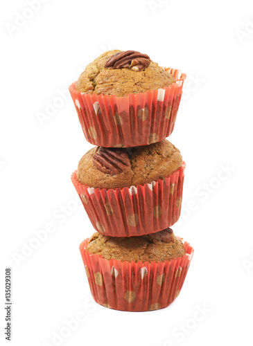 Pile of pecan nut muffins isolated