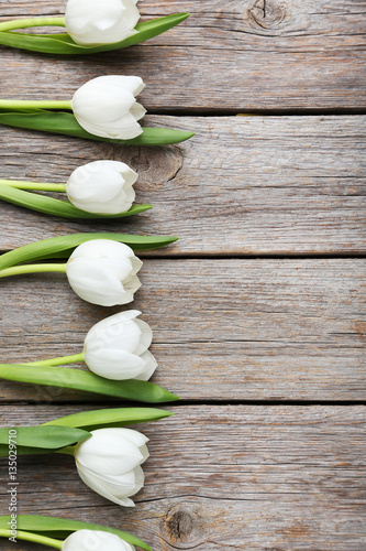 Fototapeta Naklejka Na Ścianę i Meble -  Bouquet of tulips on a grey wooden table