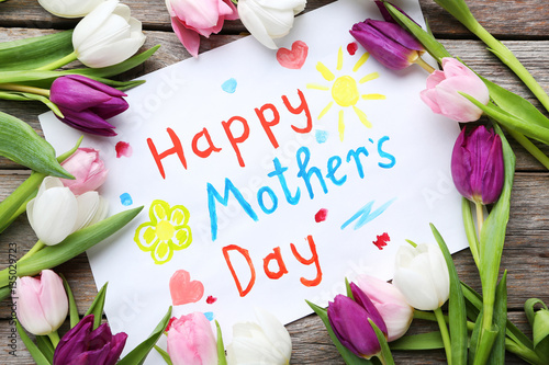 Fototapeta Naklejka Na Ścianę i Meble -  Bouquet of tulips for happy mother's day on grey wooden table