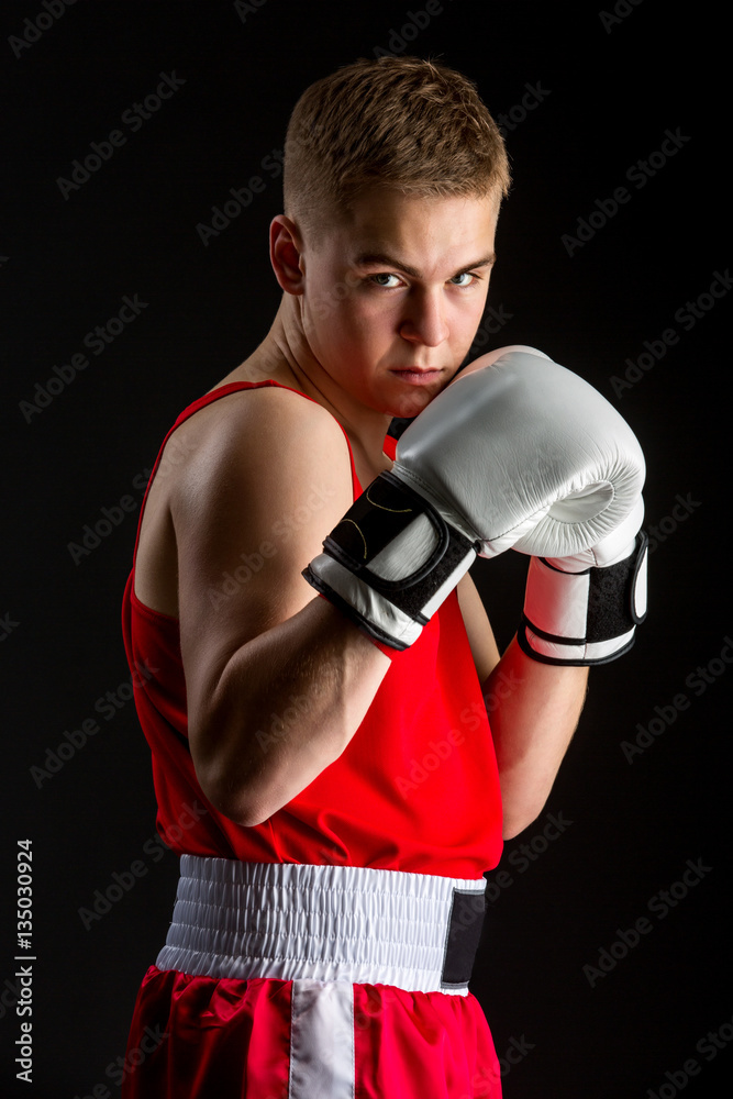 Young boxer sportsman in red sport suit