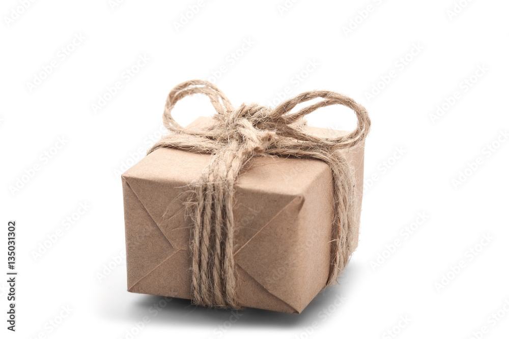 Boxes with gift wrapped in kraft paper on isolated white backgro Boxes with gift wrapped in kraft paper on isolated white backgro