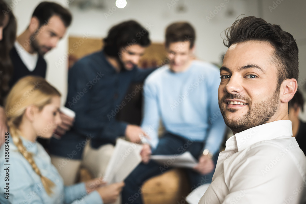 Multi-ethnic business people working in a trendy office Multi-ethnic business people working in a trendy office
