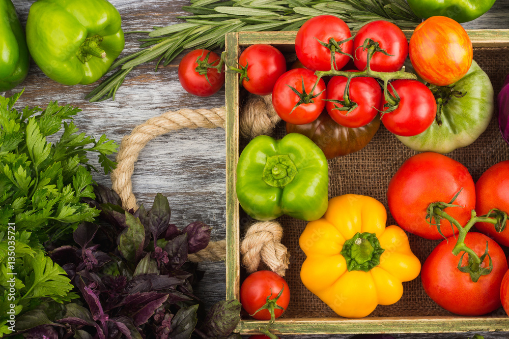 Set of different vegetables in the wooden tray Set of different vegetables in the wooden tray