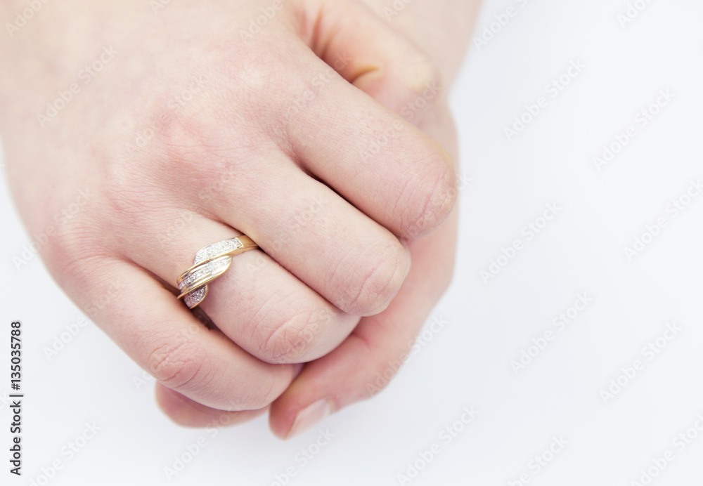 woman showing ring on finger