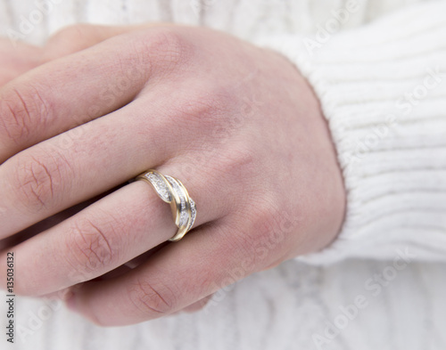 woman showing ring on finger