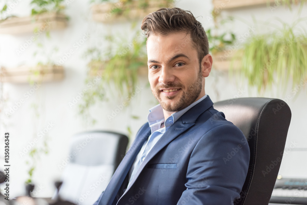 Confident man at the workplace