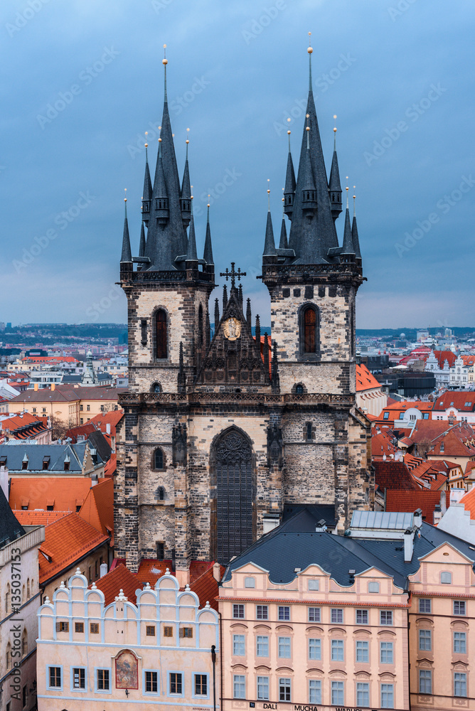 Fototapeta premium View from above on traditional Christmas market at Old Town Square illuminated and decorated for holidays in Prague - capital of Czech Republic.