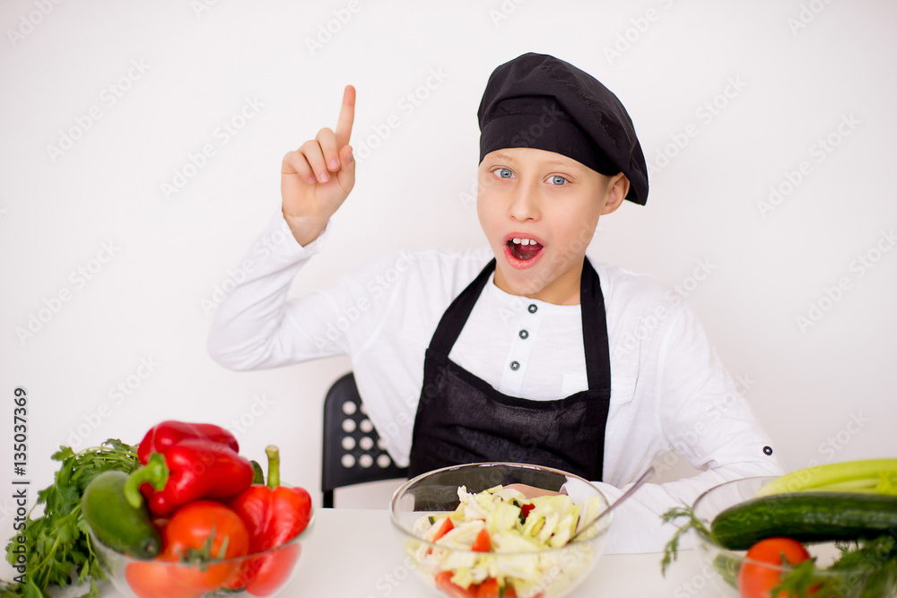 young chef came up with salad isolate young chef came up with salad isolate
