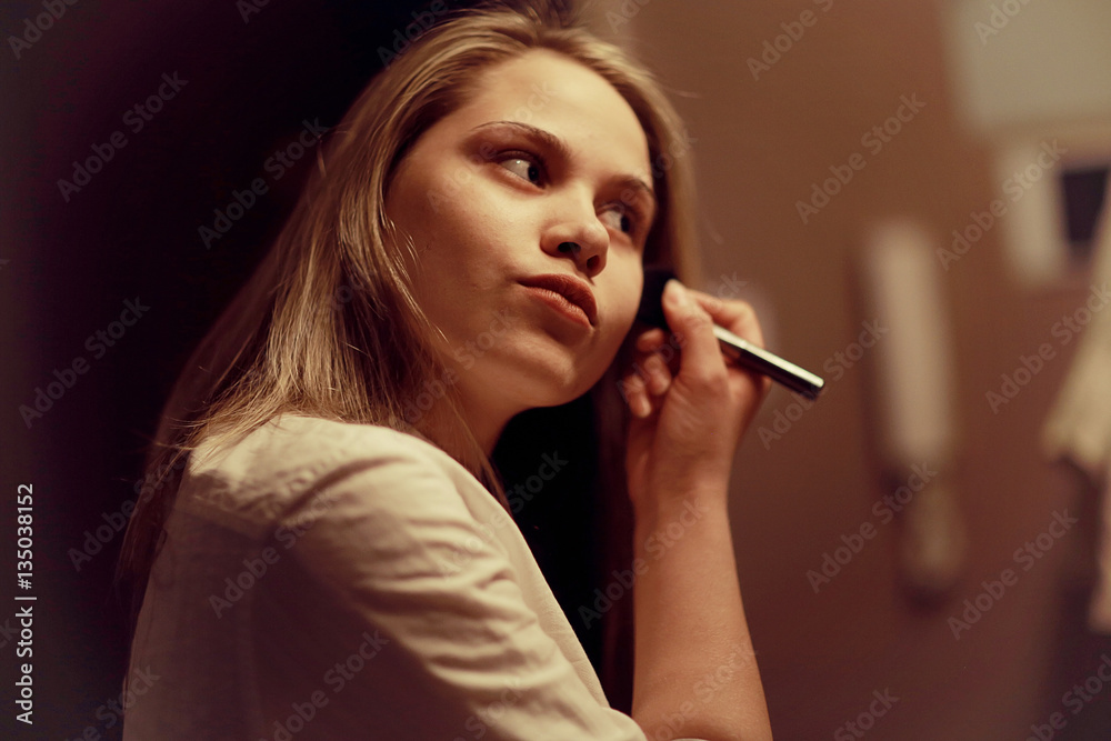 Fototapeta premium beautiful young woman at home in the apartment