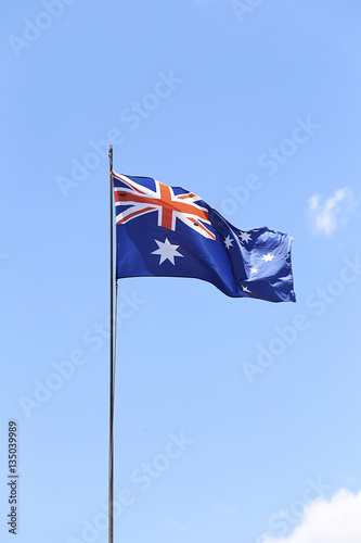 Australian flag flying on a flagpole. © BGStock72