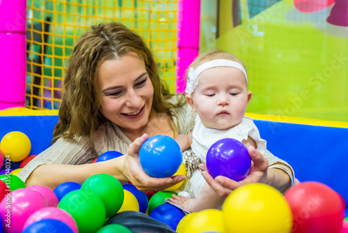 mother and child play in the children's room