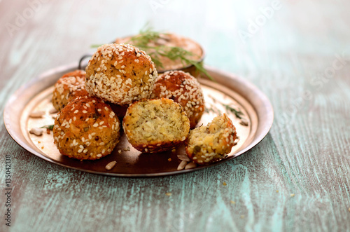 falafel with salad on copper plate