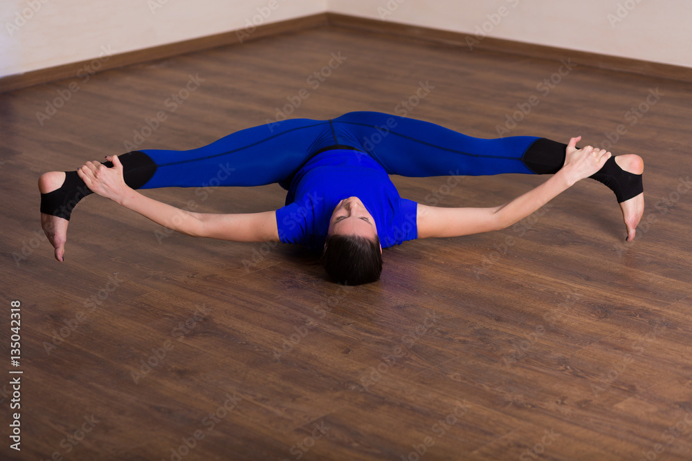 Naklejka premium Woman practicing yoga