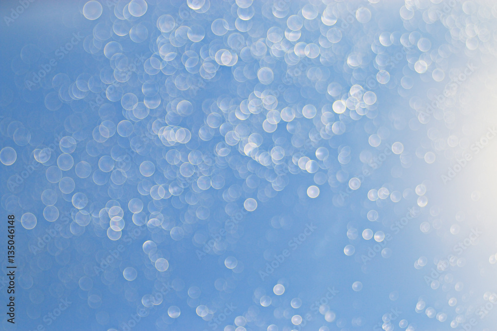 light blue background bokeh drops glass, blurred light blue background bokeh drops glass, blurred