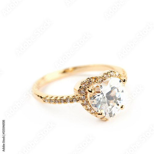 Golden ring with a gem stone isolated